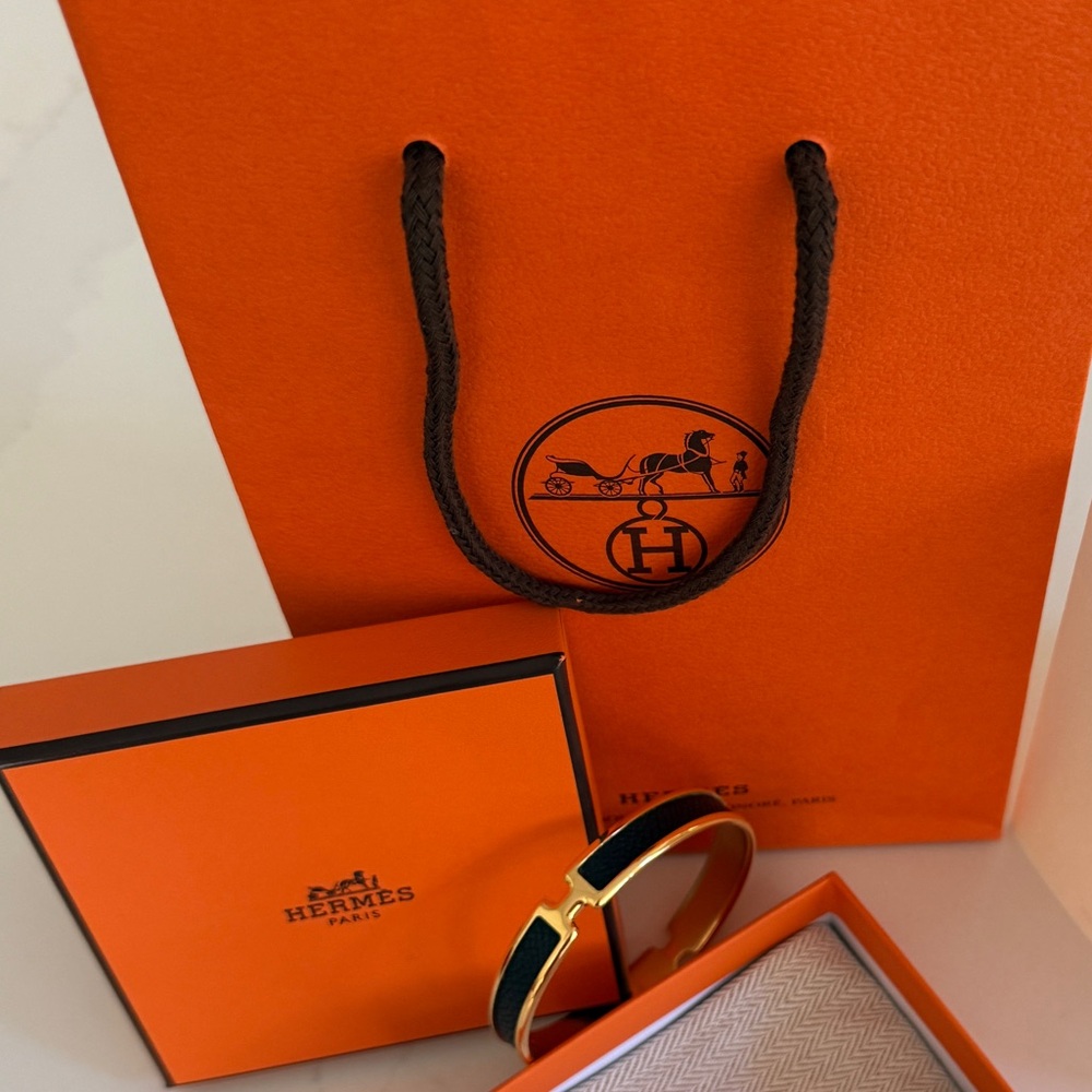 Hermès Gold and Black Cuff Bracelet